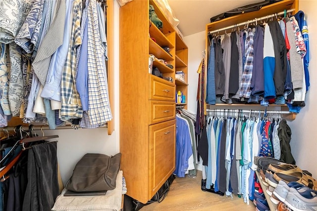 11165 Affinity Ct Unit 32, San Diego, CA 92131 - spacious closet featuring wood finished floors
