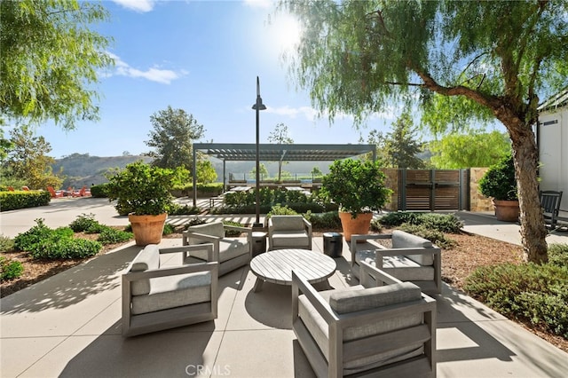 4233 Powell Way Unit 102, Corona, CA 92883 - view of patio / terrace with fence and a mountain view