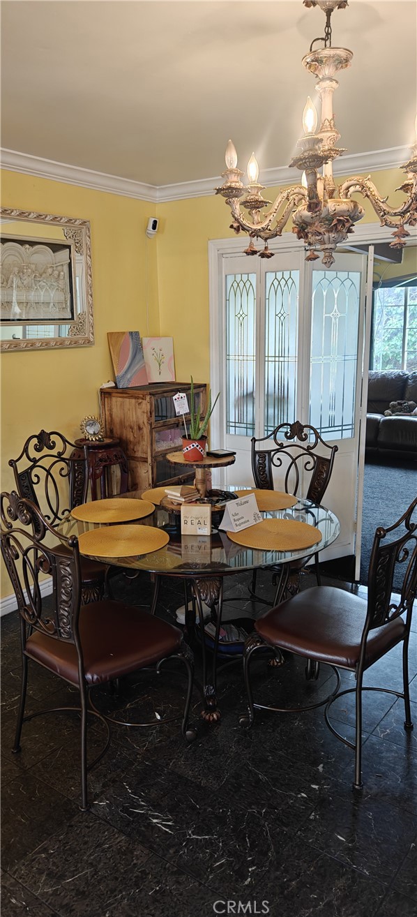 18565 E Gallarno Dr, Covina, CA 91722 - dining room with crown molding