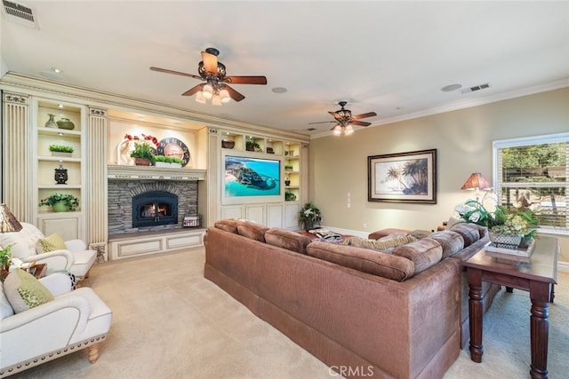 23965 Lawson Rd, Corona, CA 92883 - living room featuring light carpet, a ceiling fan, ornamental molding, built in features, and a stone fireplace