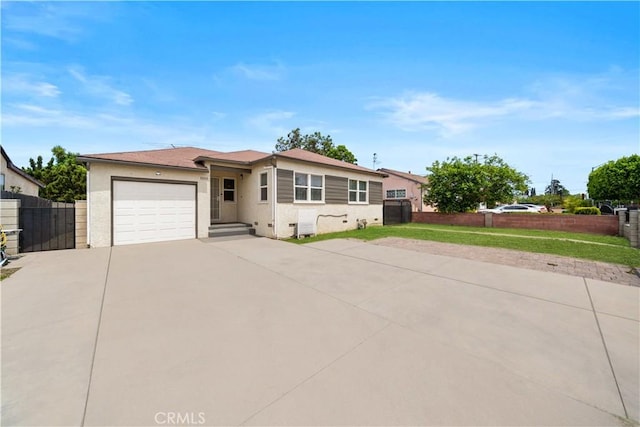 ranch-style home with concrete driveway, a garage, fence, and stucco siding