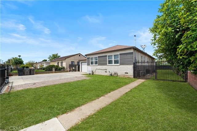 view of front of property featuring concrete driveway, a garage, and a gate