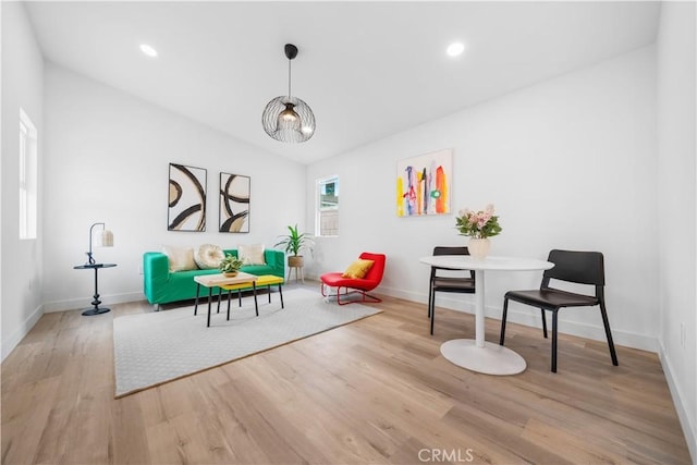 playroom with vaulted ceiling, baseboards, wood finished floors, and recessed lighting