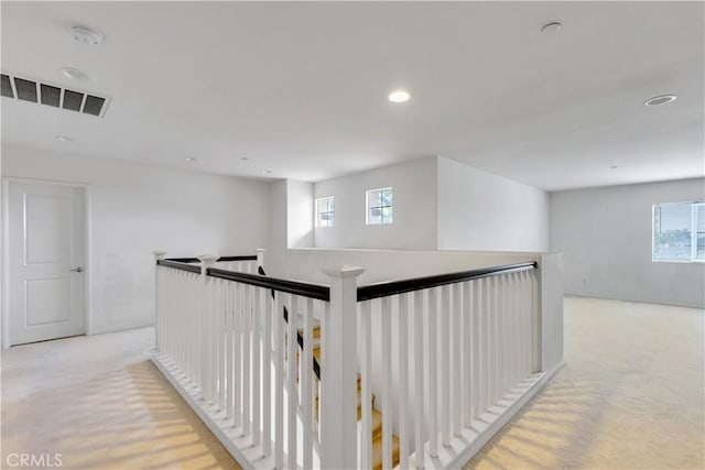 5610 Guardian Way, Chino, CA 91710 - corridor with an upstairs landing, light carpet, healthy amount of natural light, and recessed lighting