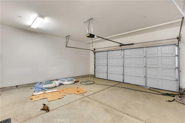 5610 Guardian Way, Chino, CA 91710 - garage featuring a garage door opener