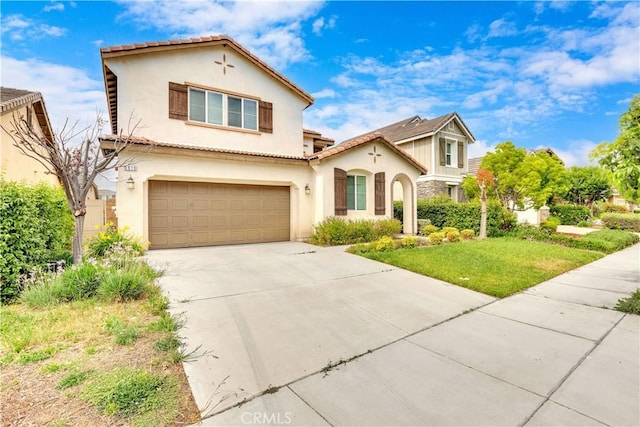 5610 Guardian Way, Chino, CA 91710 - mediterranean / spanish-style house featuring stucco siding, a garage, and concrete driveway