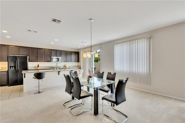 5610 Guardian Way, Chino, CA 91710 - dining room with recessed lighting and light carpet