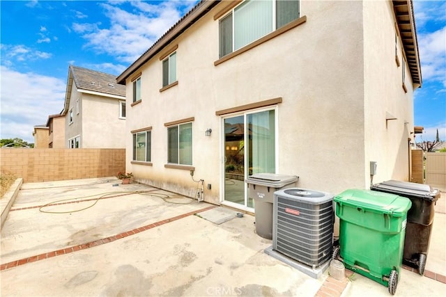 5610 Guardian Way, Chino, CA 91710 - back of house featuring a fenced backyard, a patio area, and stucco siding