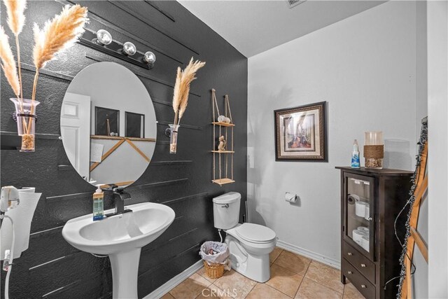 33727 Verbena, Murrieta, CA 92563 - half bathroom featuring tile patterned floors, baseboards, and toilet