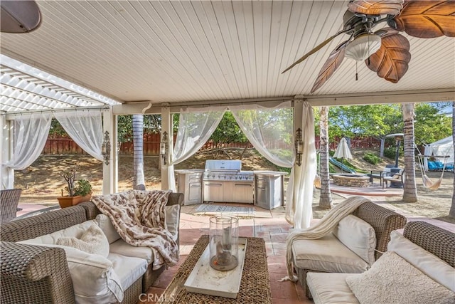 33727 Verbena, Murrieta, CA 92563 - fenced backyard featuring an outdoor living space with a fire pit and a patio