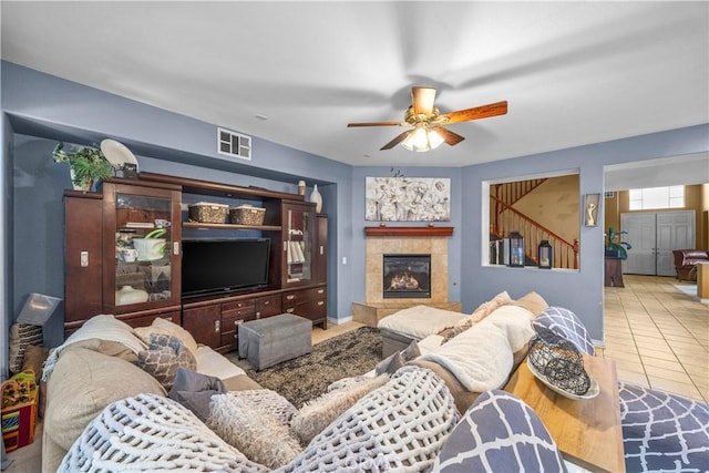 33727 Verbena, Murrieta, CA 92563 - tiled living area with ceiling fan and a fireplace