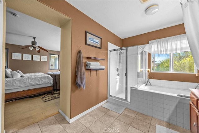 33727 Verbena, Murrieta, CA 92563 - ensuite bathroom with tile patterned flooring, a stall shower, a bath, ceiling fan, and baseboards