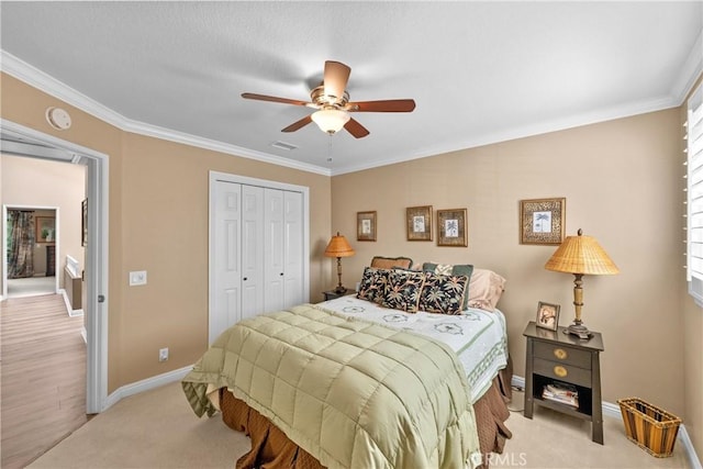 37 Giotto, Aliso Viejo, CA 92656 - bedroom with baseboards, ornamental molding, a closet, ceiling fan, and light colored carpet