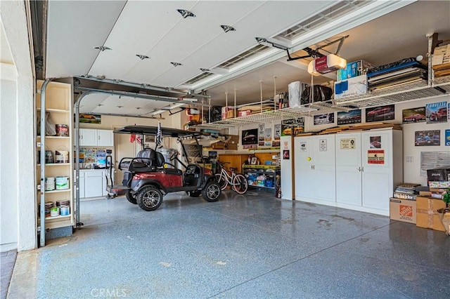 30208 White Wake Dr, Canyon Lake, CA 92587 - garage featuring a garage door opener