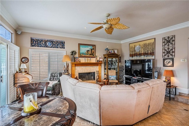30208 White Wake Dr, Canyon Lake, CA 92587 - living area with a tile fireplace, crown molding, ceiling fan, light tile patterned flooring, and baseboards