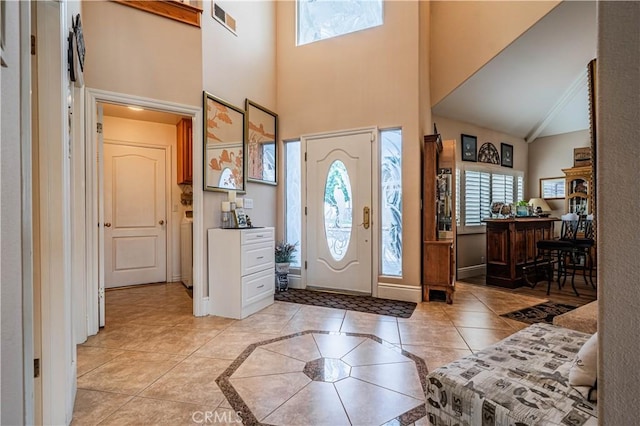 30208 White Wake Dr, Canyon Lake, CA 92587 - entrance foyer featuring plenty of natural light, high vaulted ceiling, light tile patterned floors, and baseboards