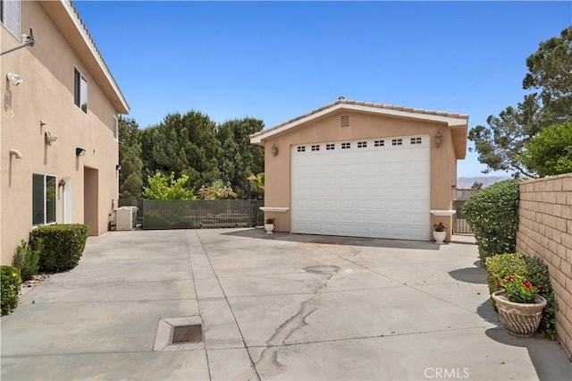 13985 Evergreen Ln, Victorville, CA 92395 - detached garage featuring fence
