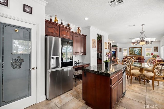 13985 Evergreen Ln, Victorville, CA 92395 - kitchen with stainless steel fridge, a kitchen island, a chandelier, light tile patterned floors, and crown molding