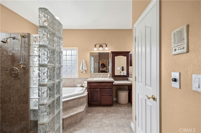 13985 Evergreen Ln, Victorville, CA 92395 - full bathroom featuring a walk in shower, a bath, vanity, and tile patterned flooring