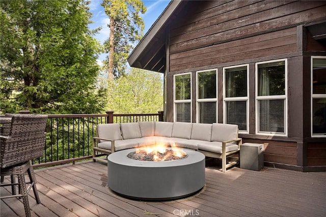 523 Dogwood Canyon Rd, Blue Jay, CA 92317 - deck with an outdoor living space with a fire pit
