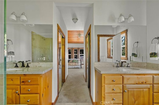 523 Dogwood Canyon Rd, Blue Jay, CA 92317 - ensuite bathroom featuring a stall shower, two vanities, and healthy amount of natural light
