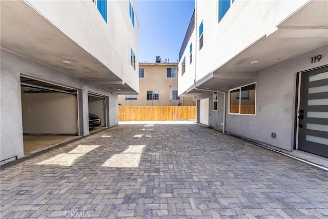 view of patio featuring fence
