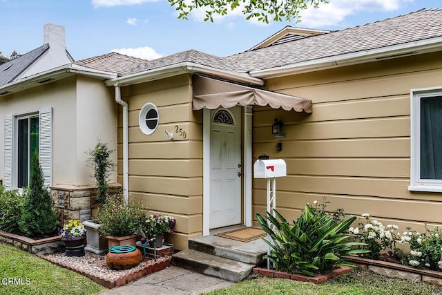 250 S Berkeley Ave, Pasadena, CA 91107 - view of exterior entry featuring a shingled roof
