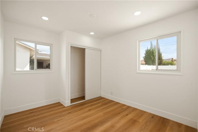 716 S Armel Dr, Covina, CA 91723 - unfurnished bedroom featuring baseboards, a closet, light wood-style floors, and recessed lighting