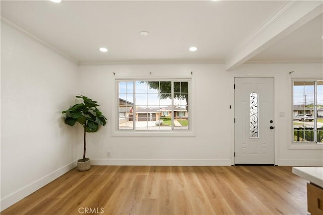 716 S Armel Dr, Covina, CA 91723 - entrance foyer with plenty of natural light, ornamental molding, light wood finished floors, recessed lighting, and baseboards