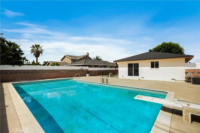 716 S Armel Dr, Covina, CA 91723 - view of pool featuring a fenced backyard, a patio, a diving board, and central air condition unit
