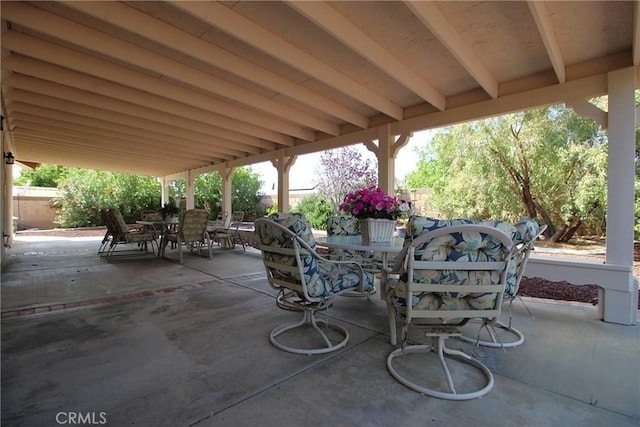 6102 Cabriolet Ct, Quartz Hill, CA 93536 - view of patio / terrace featuring outdoor dining space and a fenced backyard
