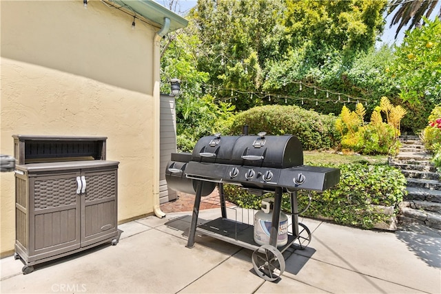13611 Walnut St, Whittier, CA 90602 - view of patio with a grill and view of wooded area