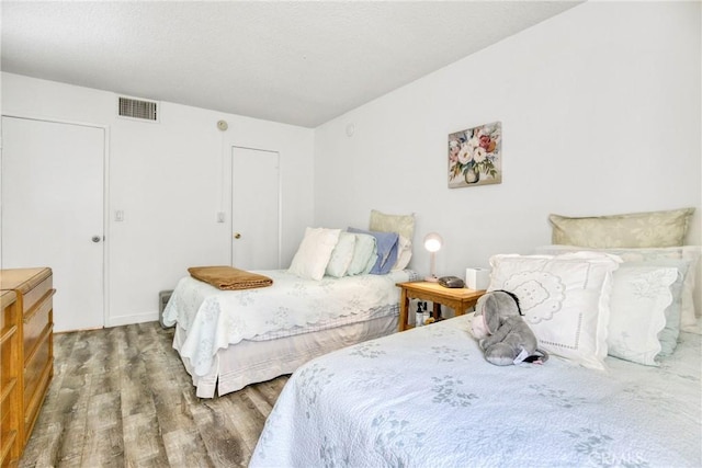 15155 Sherman Way Unit 14, Van Nuys, CA 91405 - bedroom featuring wood finished floors