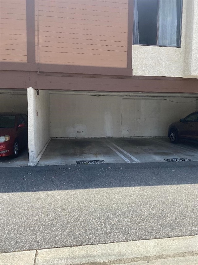 15155 Sherman Way Unit 14, Van Nuys, CA 91405 - garage featuring covered parking