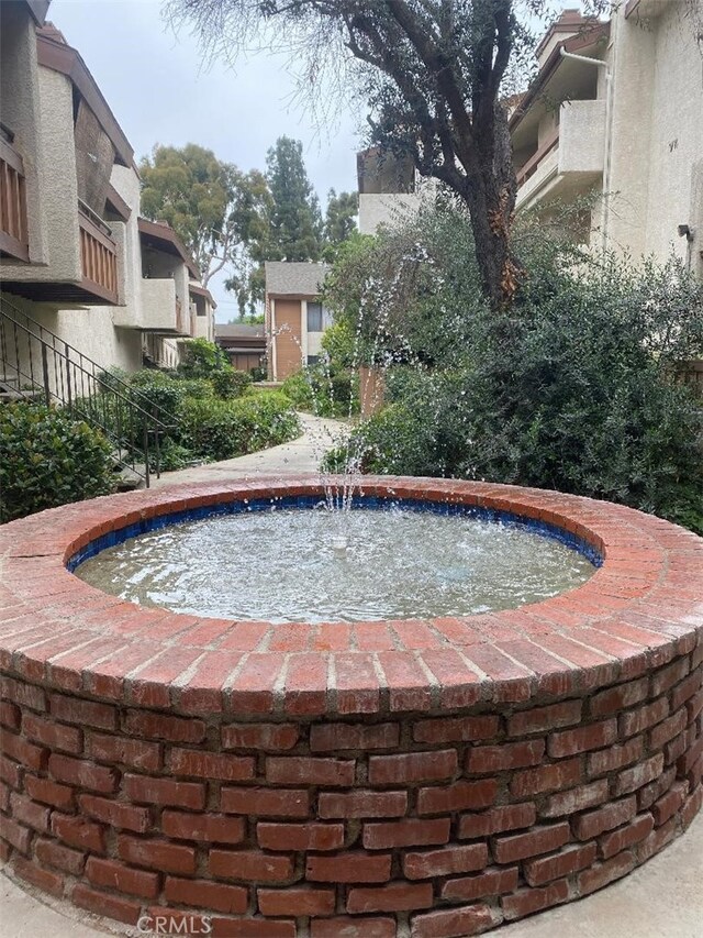 15155 Sherman Way Unit 14, Van Nuys, CA 91405 - view of home's community with a hot tub