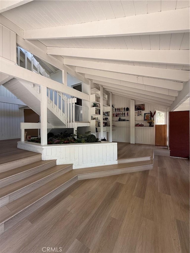 2390 Prenda Ave, Riverside, CA 92504 - stairway featuring wood finished floors, wooden walls, and wood ceiling