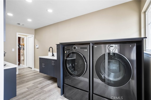 1325 N Birchnell Ave, San Dimas, CA 91773 - laundry area with separate washer and dryer, light wood-type flooring, recessed lighting, baseboards, and a sink