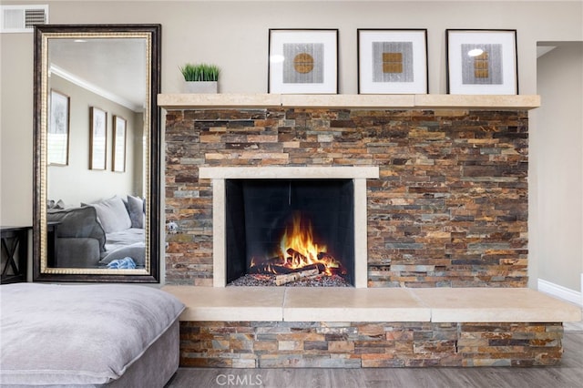 1325 N Birchnell Ave, San Dimas, CA 91773 - detailed view of ornamental molding, wood finished floors, a fireplace, and baseboards