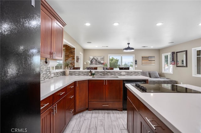 1325 N Birchnell Ave, San Dimas, CA 91773 - kitchen with a sink, a peninsula, black appliances, light countertops, and recessed lighting