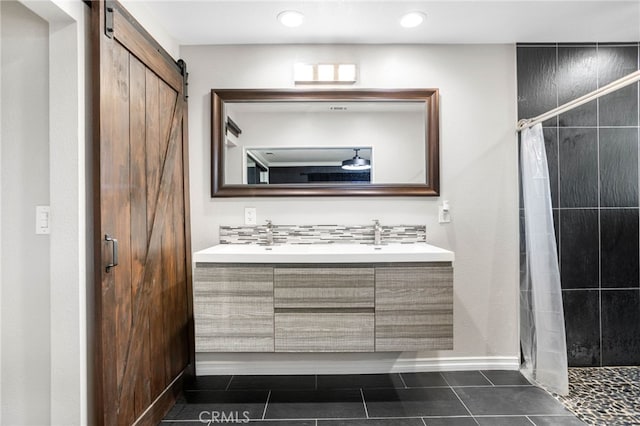 1325 N Birchnell Ave, San Dimas, CA 91773 - full bathroom with tiled shower, tile patterned flooring, double vanity, baseboards, and recessed lighting