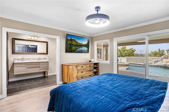 1325 N Birchnell Ave, San Dimas, CA 91773 - bedroom with access to exterior, baseboards, crown molding, dark wood-style flooring, and ensuite bath