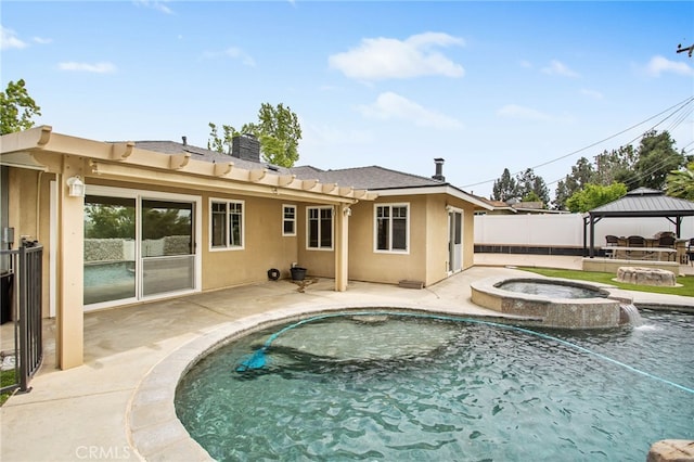 1325 N Birchnell Ave, San Dimas, CA 91773 - back of house with a gazebo, a chimney, stucco siding, and a patio area