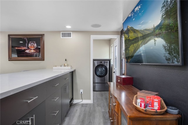 1325 N Birchnell Ave, San Dimas, CA 91773 - washroom featuring washer / dryer, light wood-style floors, baseboards, and recessed lighting