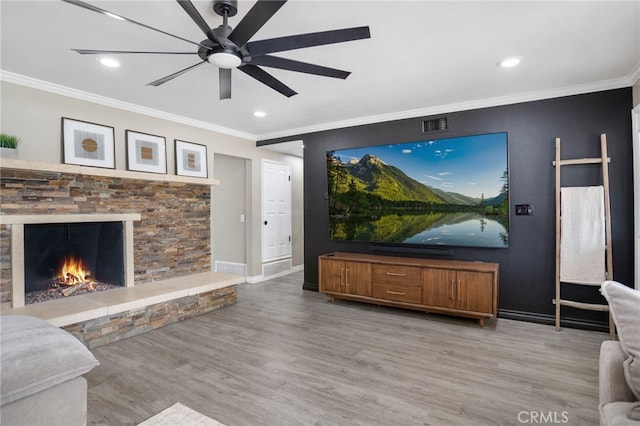 1325 N Birchnell Ave, San Dimas, CA 91773 - living room featuring wood finished floors, ornamental molding, a ceiling fan, a fireplace, and recessed lighting