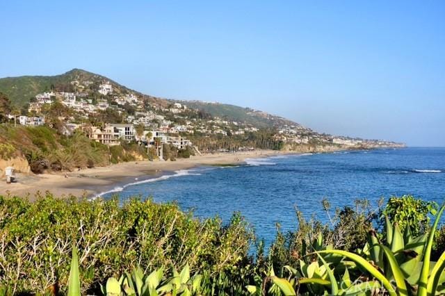 2262 Via Puerta Unit A, Laguna Woods, CA 92637 - water view with a mountain backdrop