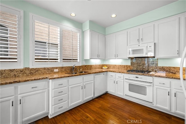27567 Courtview Dr, Valencia, CA 91354 - kitchen featuring white appliances, a sink, white cabinets, stone counters, and dark wood-style flooring