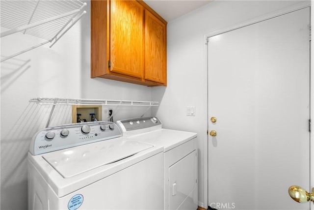 27567 Courtview Dr, Valencia, CA 91354 - clothes washing area featuring cabinet space and washing machine and dryer