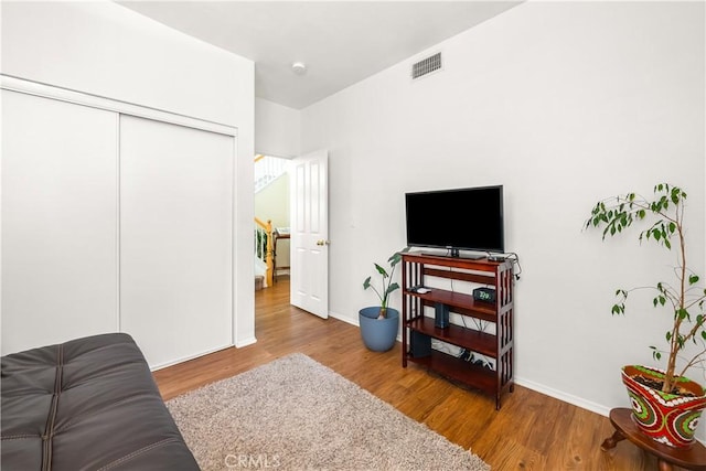 27567 Courtview Dr, Valencia, CA 91354 - bedroom with wood finished floors, a closet, and baseboards