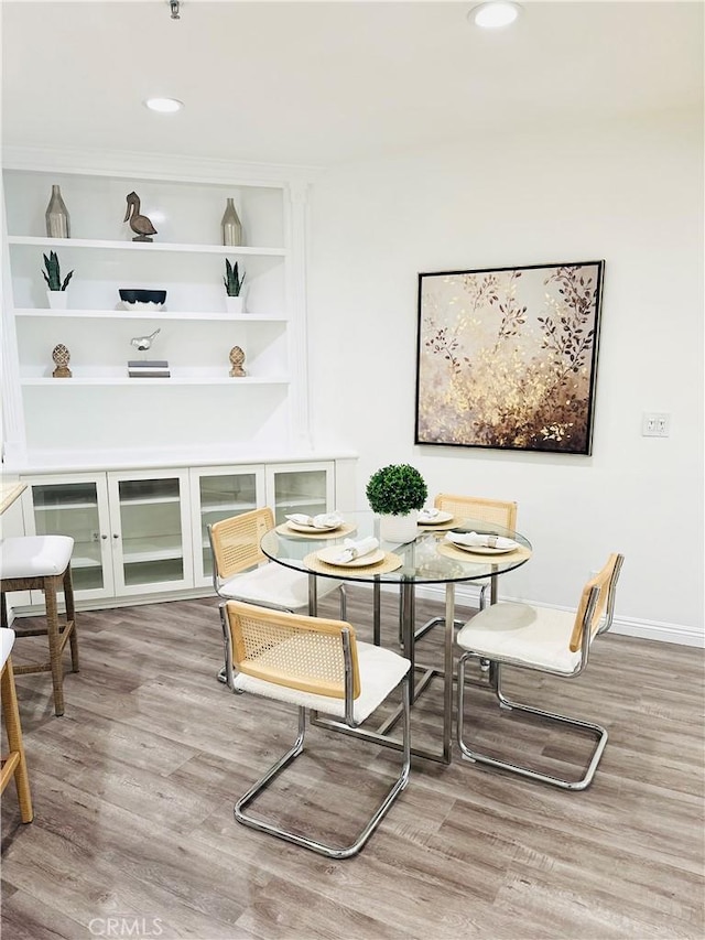 235 Main St Unit 118, Venice, CA 90291 - dining space featuring wood finished floors, recessed lighting, and built in shelves