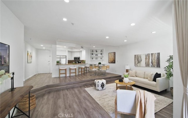 235 Main St Unit 118, Venice, CA 90291 - living area featuring wood finished floors and recessed lighting
